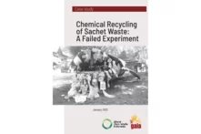 Title: Chemical Recycling of Sachet Waste: A Failed Experiment. Shark mouth statue on a playground filled with waste