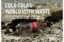 Empty Coca Cola bottle lying on pebbles. Title: Coca Cola's World With Waste. OCEANA