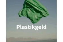 Green plastic bag flying in the wind