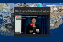 Video Preview: Woman in a black costume talking. Colourfully designed background