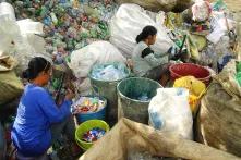 Women sorting plastic trash