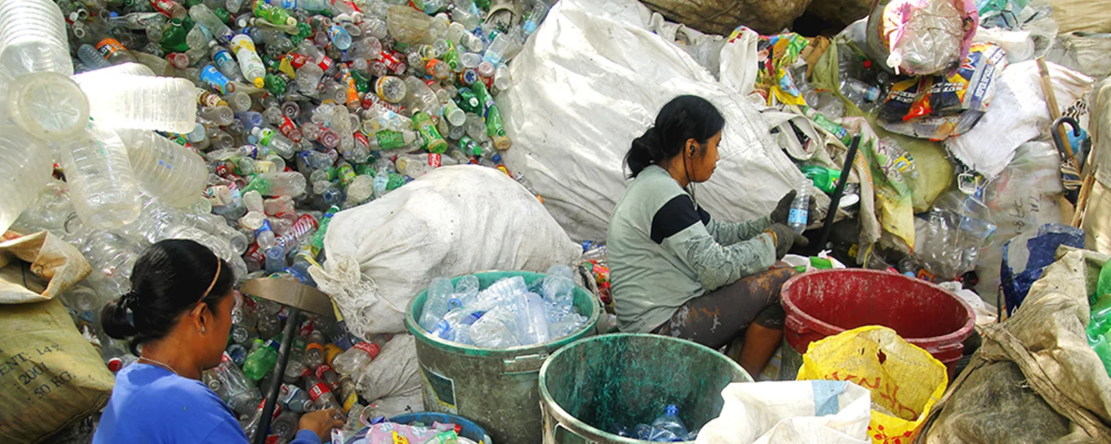 Women sorting plastic trash